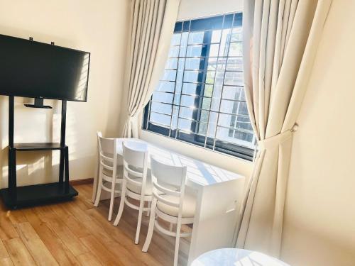 Μια τηλεόραση ή/και κέντρο ψυχαγωγίας στο LushStay Cao Bá Quát