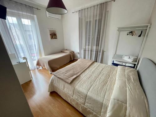 Postel nebo postele na pokoji v ubytování B&B Iris