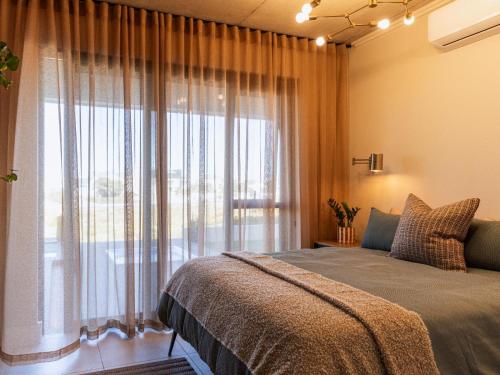 Ένα ή περισσότερα κρεβάτια σε δωμάτιο στο Villa and Studio Eiland