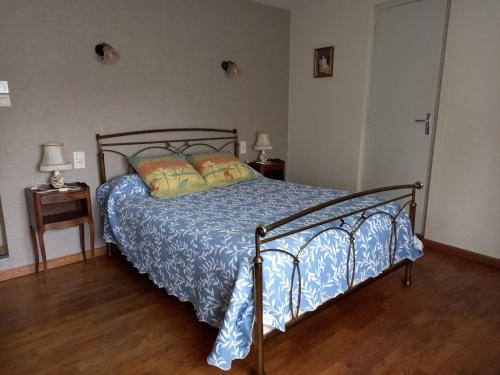 Ένα ή περισσότερα κρεβάτια σε δωμάτιο στο Maison cosy et agreable