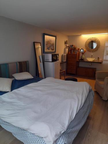 Кровать или кровати в номере Escala Tolosa