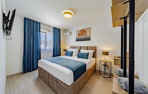 En eller flere senge i et værelse på Villa Antea by Villas Guide