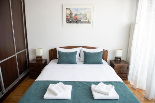 Кровать или кровати в номере Apartments Belvedere