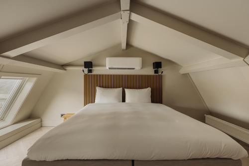 En eller flere senge i et værelse på De Ooievaar