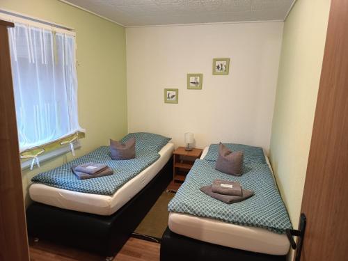 Postel nebo postele na pokoji v ubytování Ferienhaus Hüfler 59