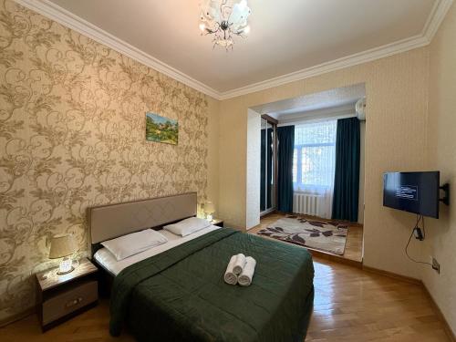 En eller flere senge i et værelse på Sahil apart