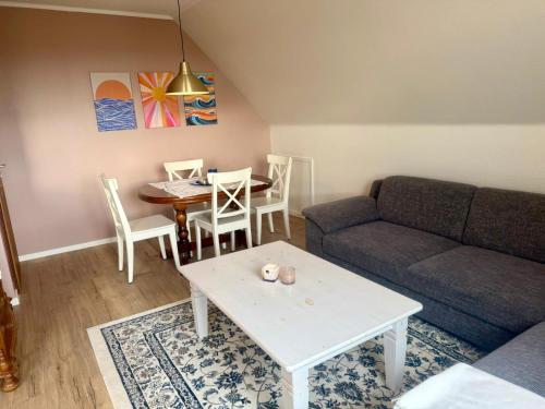 منطقة جلوس في Ferienwohnung Lütte Koje beim Hinrichs Gasthof