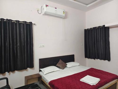 Ένα ή περισσότερα κρεβάτια σε δωμάτιο στο Hotel O Platinum