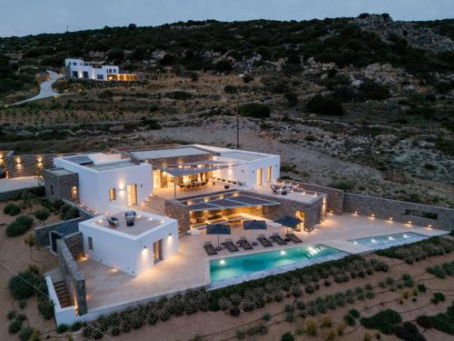 an aerial view of a house with a pool at Aegean Hestia Luxury Villa of Paros in Kampos Paros