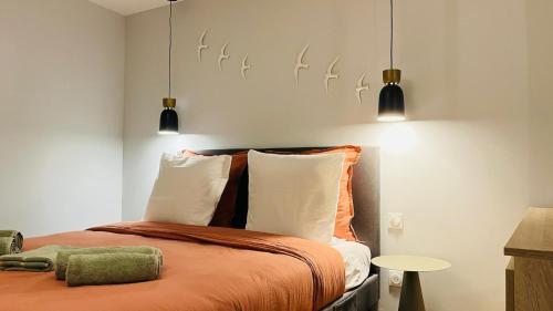 En eller flere senge i et værelse på Le Triplex Chic & Choc - Disneyland Paris