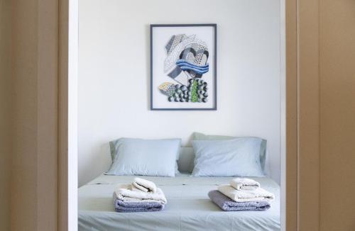 Postel nebo postele na pokoji v ubytování Villas Velanidies