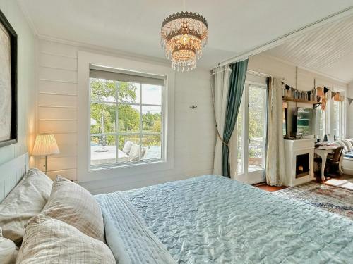 Ένα ή περισσότερα κρεβάτια σε δωμάτιο στο Präriens Pärla