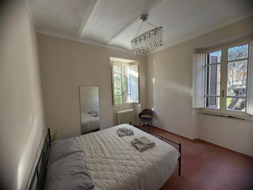 Ένα ή περισσότερα κρεβάτια σε δωμάτιο στο Guest House Foschi Apartment