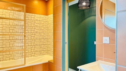 Et badeværelse på Le Triplex Chic & Choc - Disneyland Paris