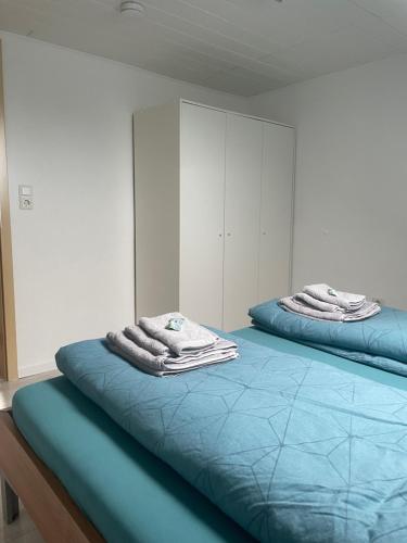 Ένα ή περισσότερα κρεβάτια σε δωμάτιο στο FeWo zur kleinen Auszeit