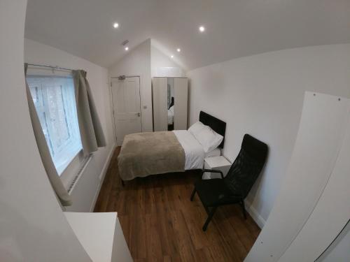 Postel nebo postele na pokoji v ubytování Woodrow close