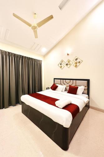 Ένα ή περισσότερα κρεβάτια σε δωμάτιο στο Asmeera Stays 2BHK Pinewood with swimming pool