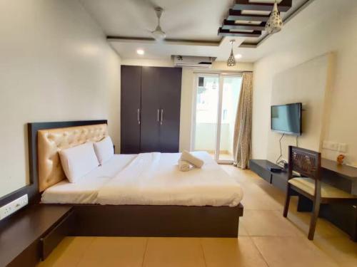 En eller flere senge i et værelse på Salt & Sand Homestays