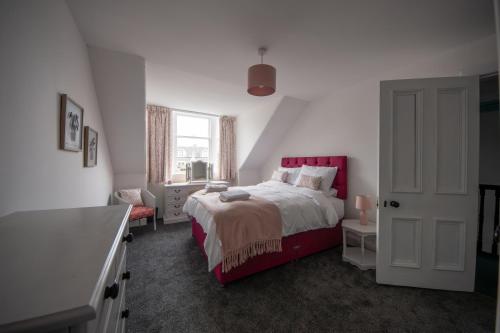 Кровать или кровати в номере Island View