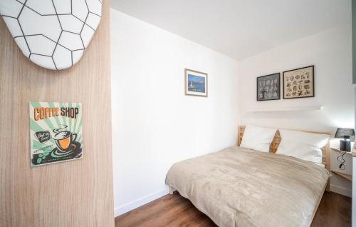 Ένα ή περισσότερα κρεβάτια σε δωμάτιο στο Boucicaut Green Studio