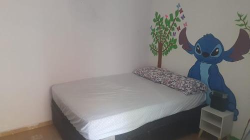 Ένα ή περισσότερα κρεβάτια σε δωμάτιο στο Juacema