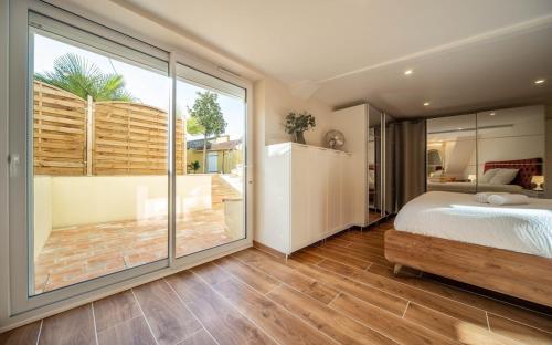 En eller flere senge i et værelse på Chalon Hacienda