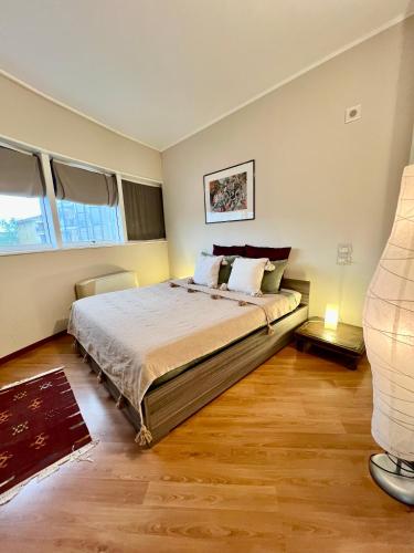 a bedroom with a large bed in a room at L'Appartamentino Montagna in Biella