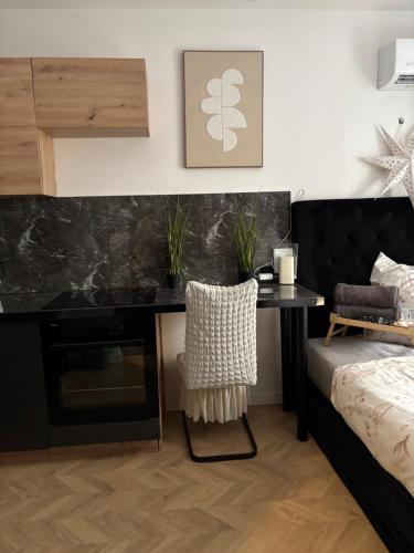 Postel nebo postele na pokoji v ubytování Cute apartament