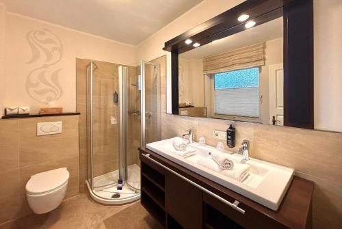 Koupelna v ubytování Ferienwohnungen Landhaus Haake