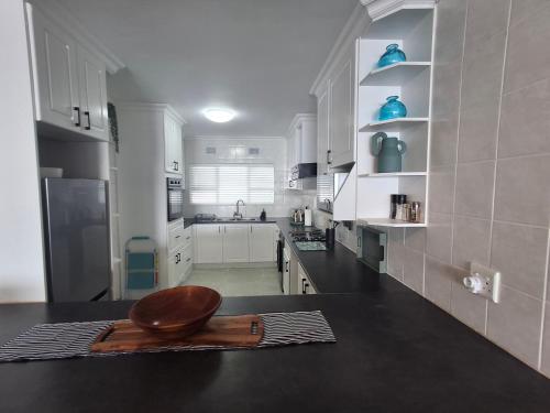 Kuchyň nebo kuchyňský kout v ubytování Nomads Nook 19