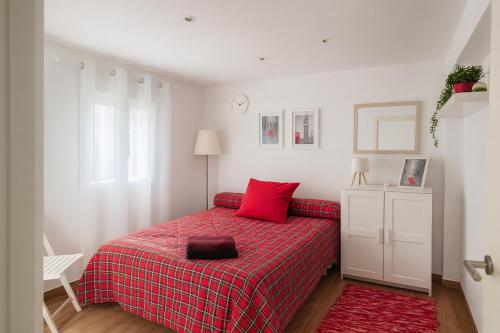 Postel nebo postele na pokoji v ubytování Tu hogar en Sevilla