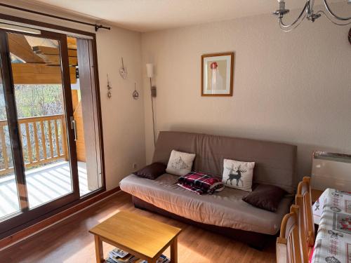 En eller flere senge i et værelse på T2 bis duplex 6 couchages situé aux BOTTIERES