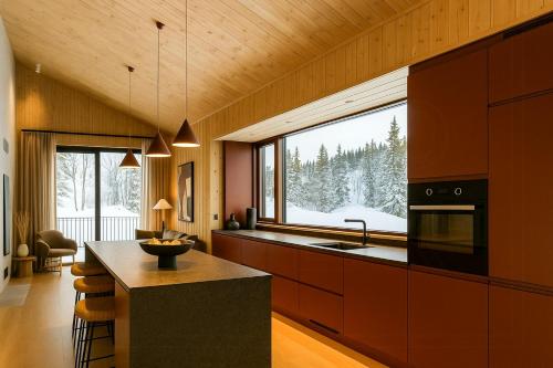 Η κουζίνα ή μικρή κουζίνα στο Arkitekttegnet Fjeldhytte På Kvitfjell Skisportssted