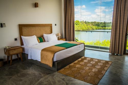 Ένα ή περισσότερα κρεβάτια σε δωμάτιο στο Six Elements Beach Villa