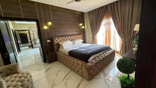 En eller flere senge i et værelse på RiverLoft penthouse