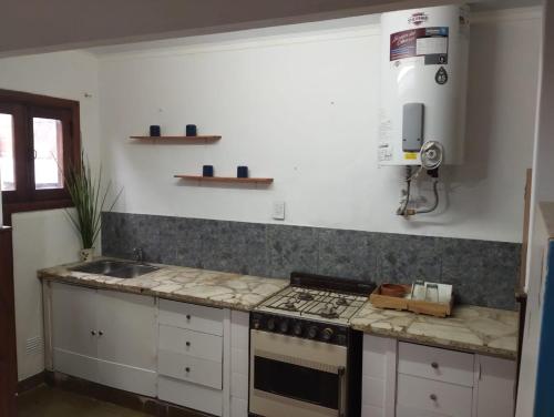 Η κουζίνα ή μικρή κουζίνα στο Casa de playa. Quequen