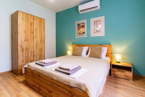 En eller flere senge i et værelse på Апартамент за гости Ирис 2 Iris guest apartment 2