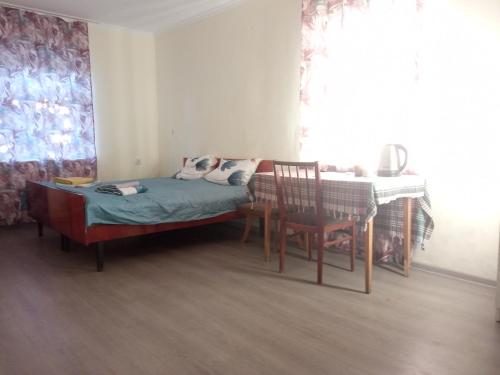Ένα ή περισσότερα κρεβάτια σε δωμάτιο στο Guest house with two rooms