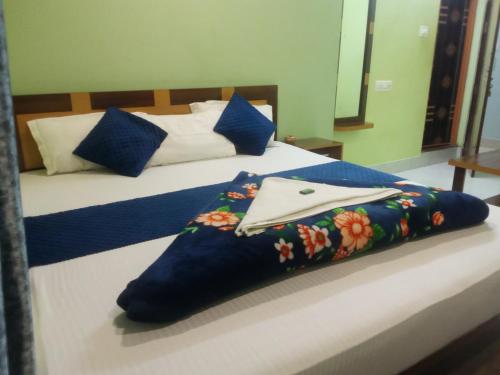 Ένα ή περισσότερα κρεβάτια σε δωμάτιο στο Durga guest house