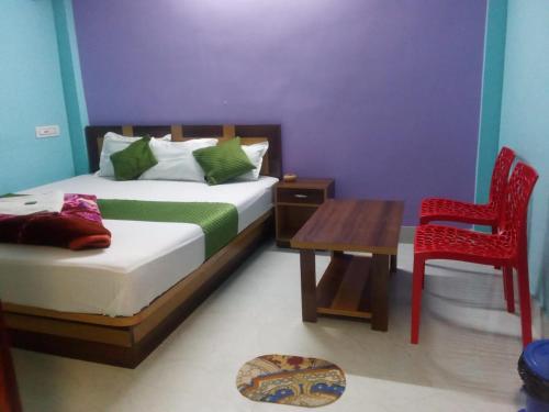 Ένα ή περισσότερα κρεβάτια σε δωμάτιο στο Durga guest house