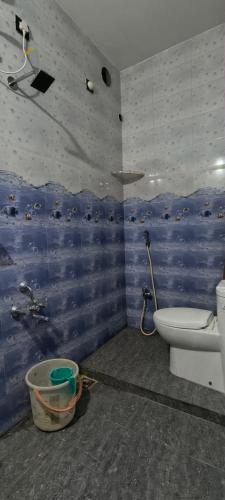 Koupelna v ubytování Karthigai Homestay