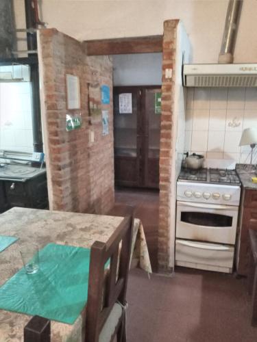 Kuchyň nebo kuchyňský kout v ubytování La Mima