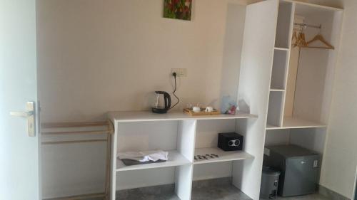 Tiện nghi pha trà/cà phê tại Calma Eco Hotel