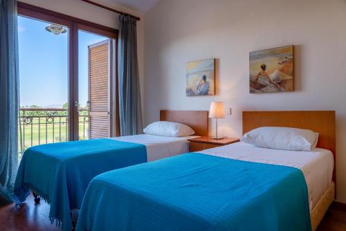 Ένα ή περισσότερα κρεβάτια σε δωμάτιο στο 3 bedroom Villa Cardia with private pool, Aphrodite Hills Resort