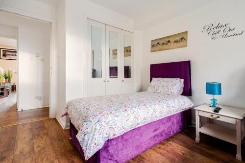 Ένα ή περισσότερα κρεβάτια σε δωμάτιο στο 3 beds,2 bedroom apt near city centre Glasgow