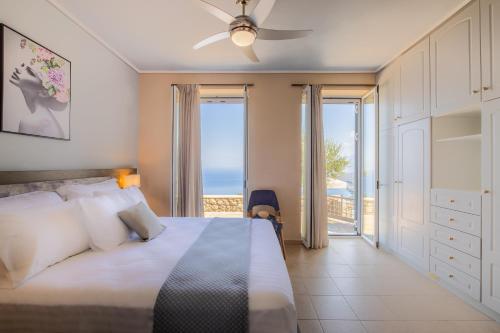 En eller flere senge i et værelse på Searocks Exclusive Village