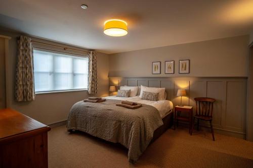 En eller flere senge i et værelse på 3 Bed in Trefriw oc-p33621