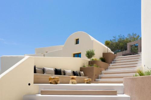 a set of stairs leading up to a house at Elessa Hotel in Pirgos