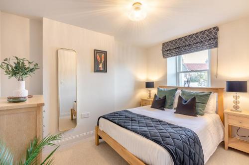 een slaapkamer met een bed en een groot raam bij 2 Bed in Norham oc-p34181 in Norham