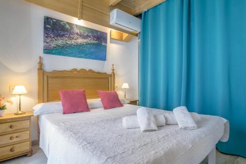 Postel nebo postele na pokoji v ubytování Corralitos Suite